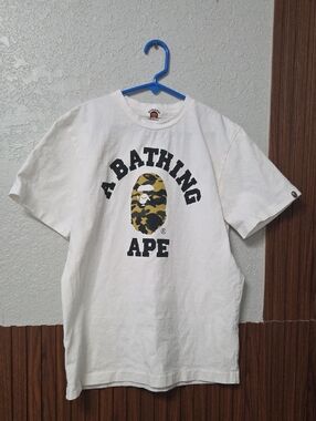 A Bathing Ape White Tee with Yellow Camo Logo Size 12 To 14